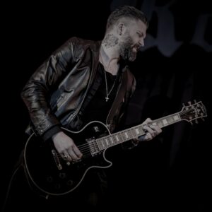 Ross Harding playing an electric guitar