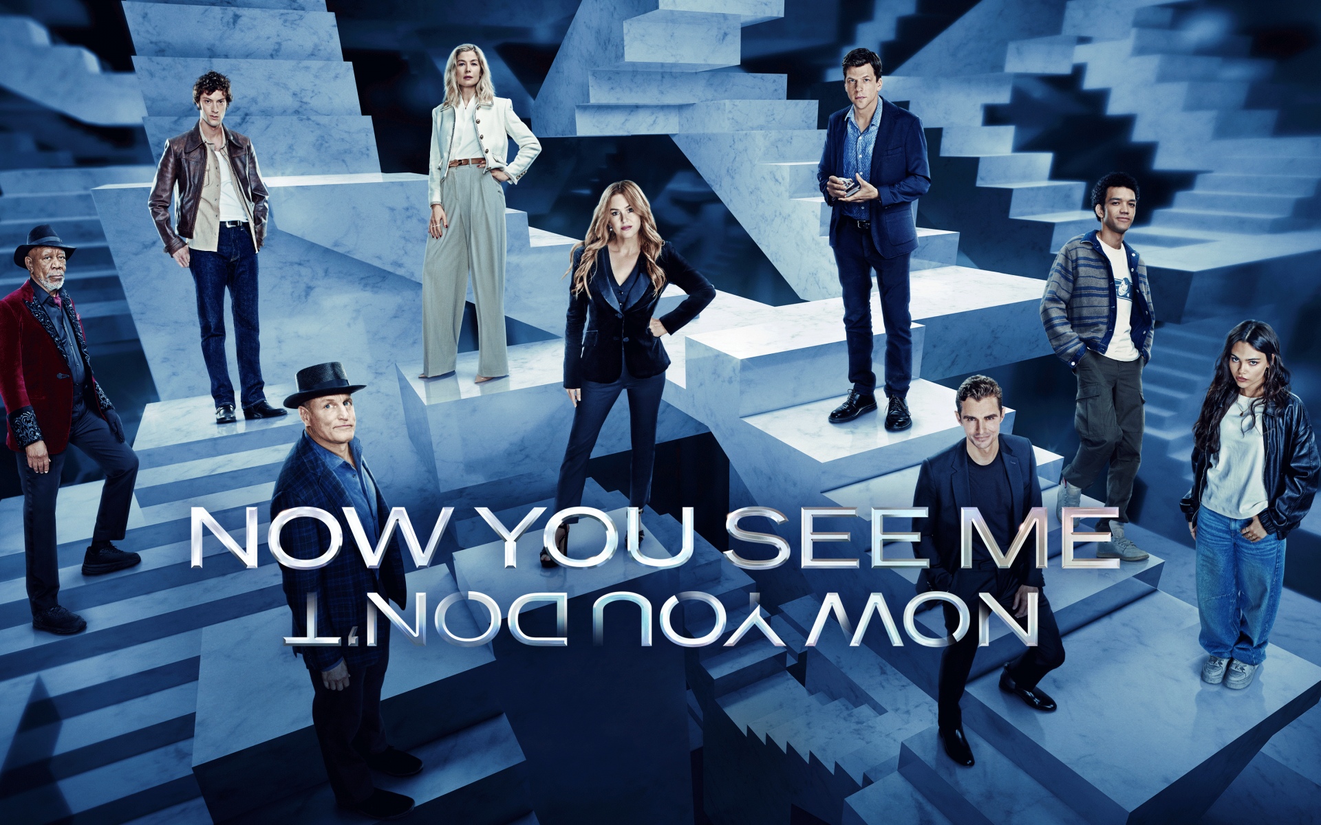 Promotional poster for Now You See Me, showing a diverse group of magicians on blue marble staircases with the title text at the bottom of the image.