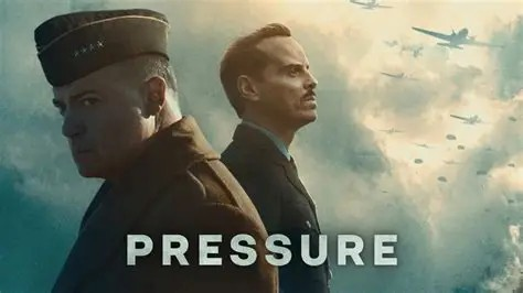 Wearing world war 2 military dress Brendan Fraser as General Dwight 'Ike' Eisenhower and Andrew Scott as Royal Airforce officer James Stagg, standing next to each, looking in opposite directions, with a cloudy sky in the background