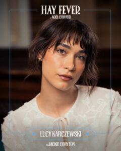 Poster-style portrait of a woman in a white lace blouse, with 'HAY FEVER' title at top and 'LUCY KARCZEWSKI' at the bottom, announcing she is Jackie Coryton.